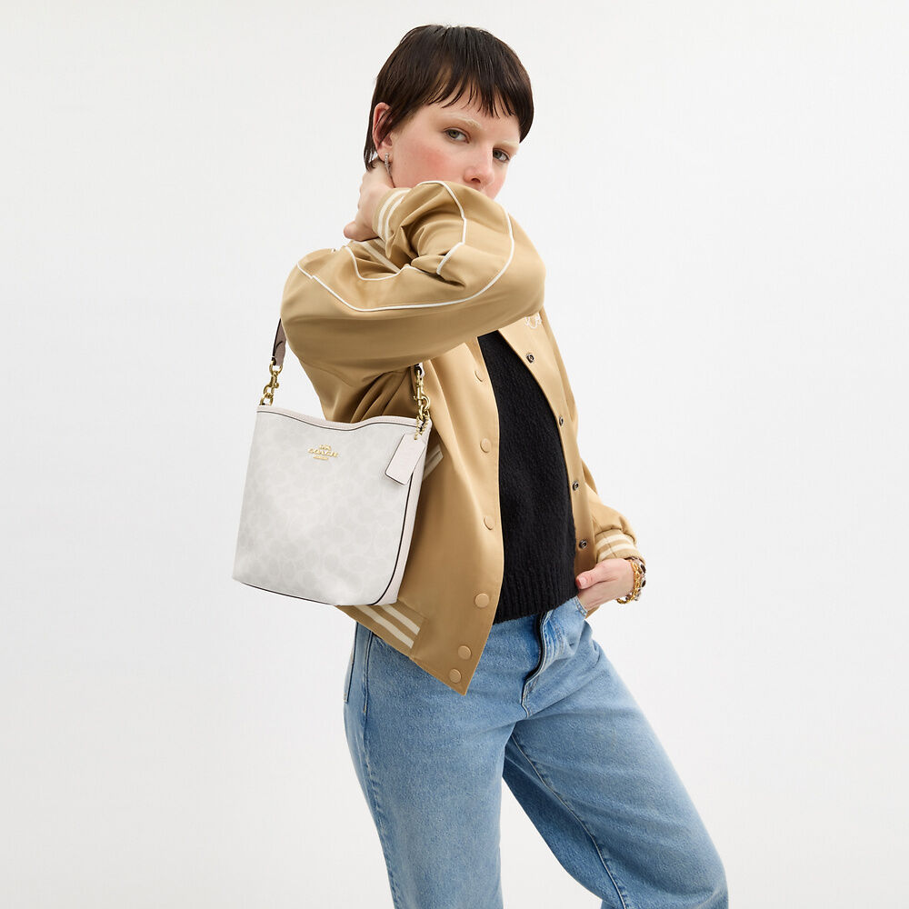 City Bucket Bag In Signature Canvas